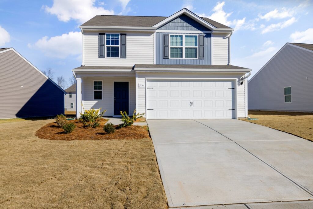 White and Blue House Under Blue Sky fix by Garage Door Repair New Providence, NJ